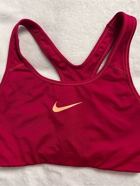 Nike Women's Raspberry Racerback Sports Bra with Peach Swoosh